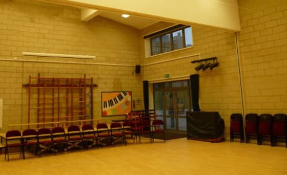 Sports hall acoustic improvement with sound absorption panels