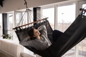 Woman takes a nap in hammock