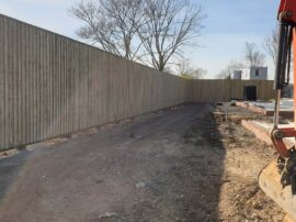 Finshed acoustic fence for Hill House Homes